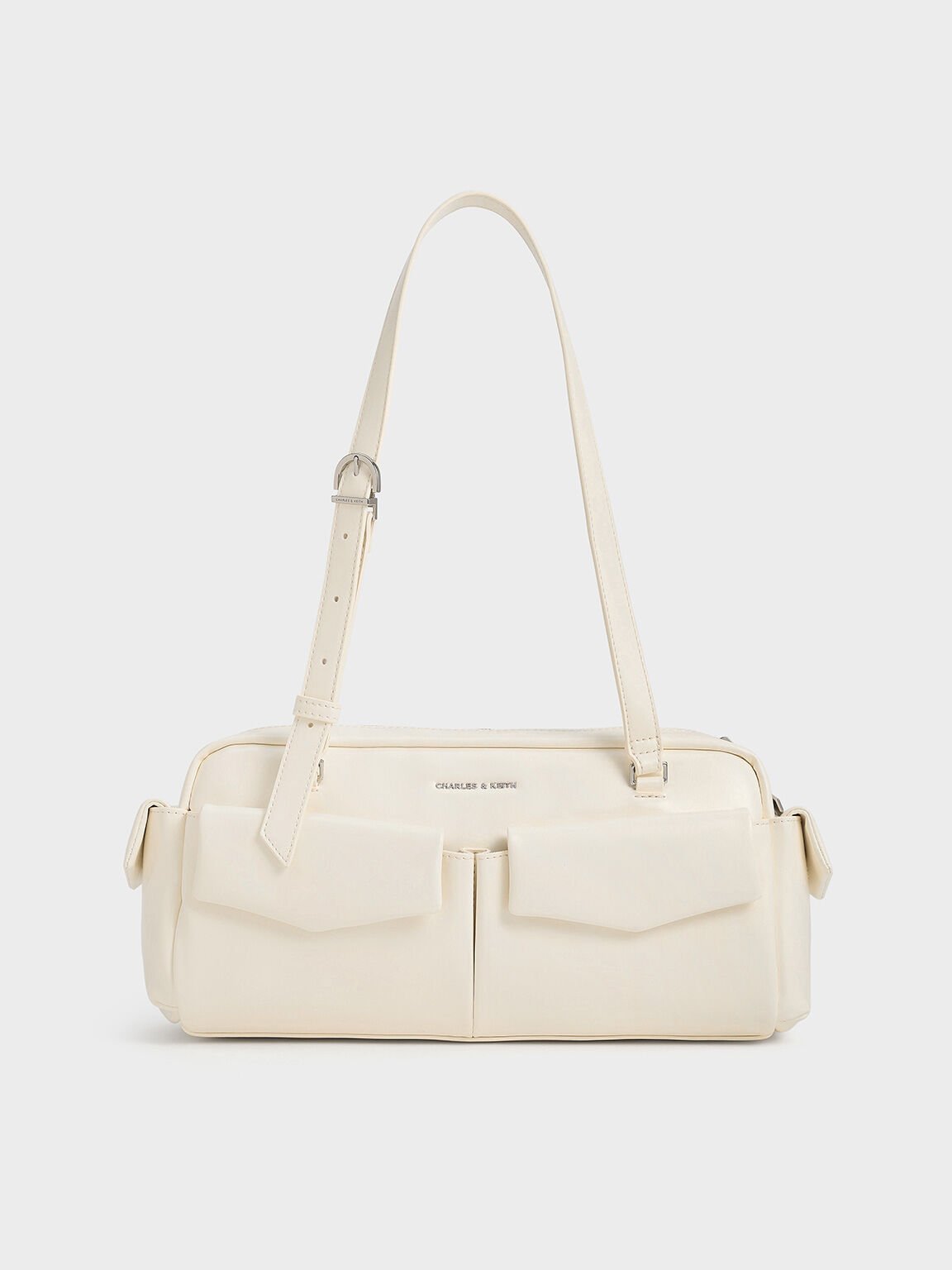 Rachel Elongated Multi-Pocket Shoulder Bag
- Cream