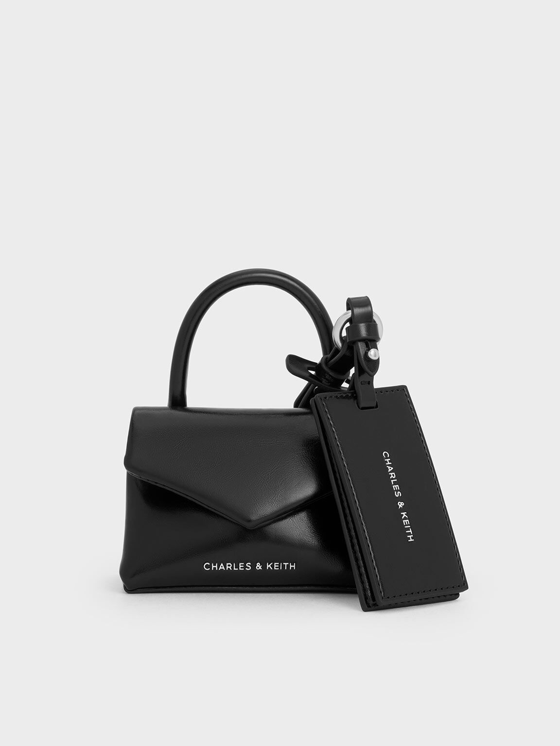 Andromeda Micro Bag Charm
- Noir