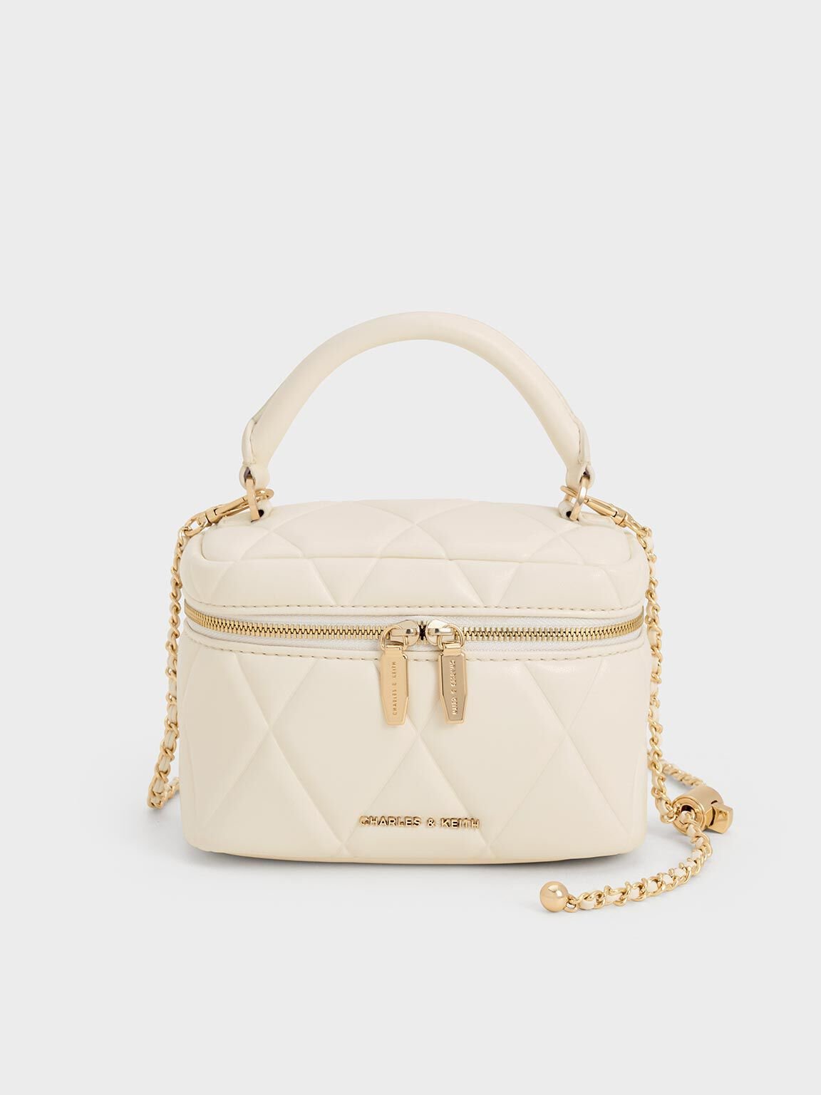 Arwen Quilted Top Handle Vanity Bag
- Cream