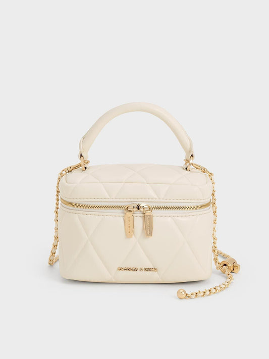 Arwen Quilted Top Handle Vanity Bag
- Cream