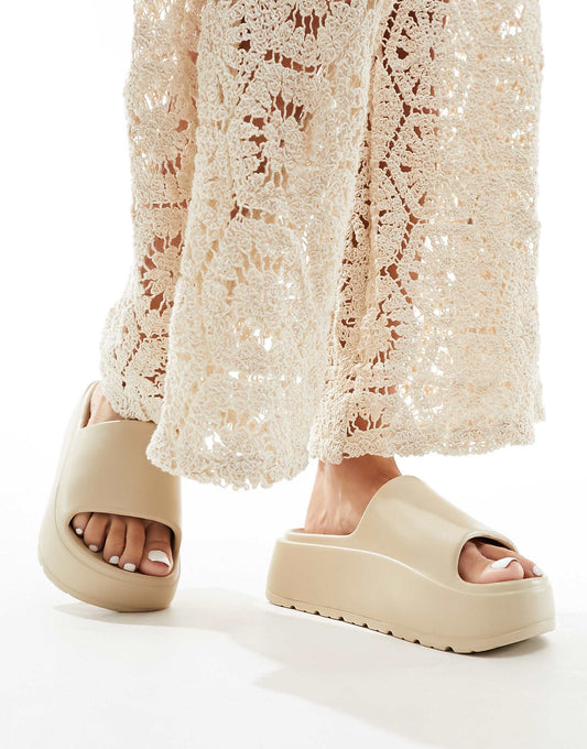 ASOS DESIGN Wide Fit Freedom cleated flatform slider in off-white