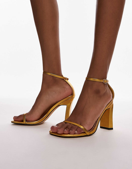 صندل بكعب عالٍ من جزئين باللون الذهبي من Topshop Goldie