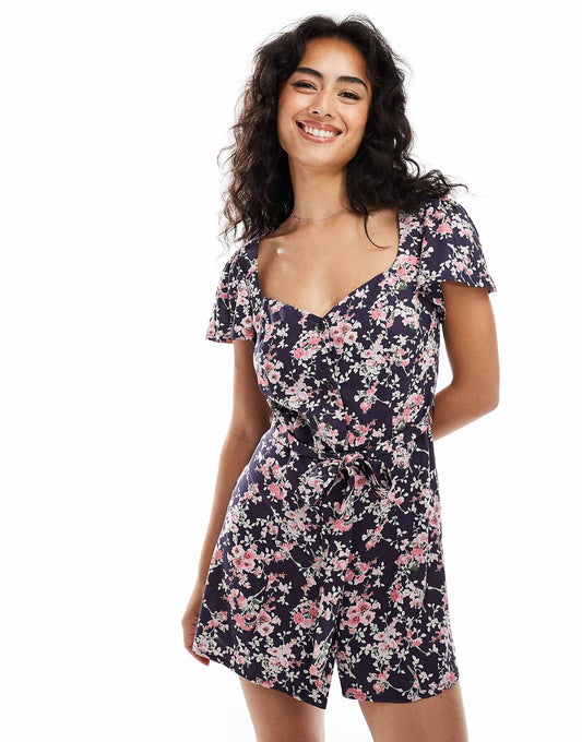 ASOS DESIGN button through mini tea dress with tie back in navy rose print