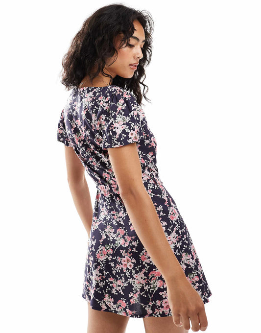 ASOS DESIGN button through mini tea dress with tie back in navy rose print