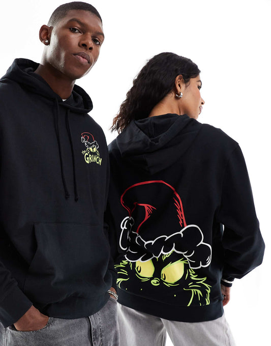 هودي كبير الحجم للجنسين من ASOS DESIGN بطبعات احتفالية The Grinch باللون الأسود