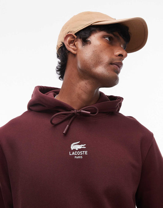 هودي بشعار من Lacoste باللون العنابي