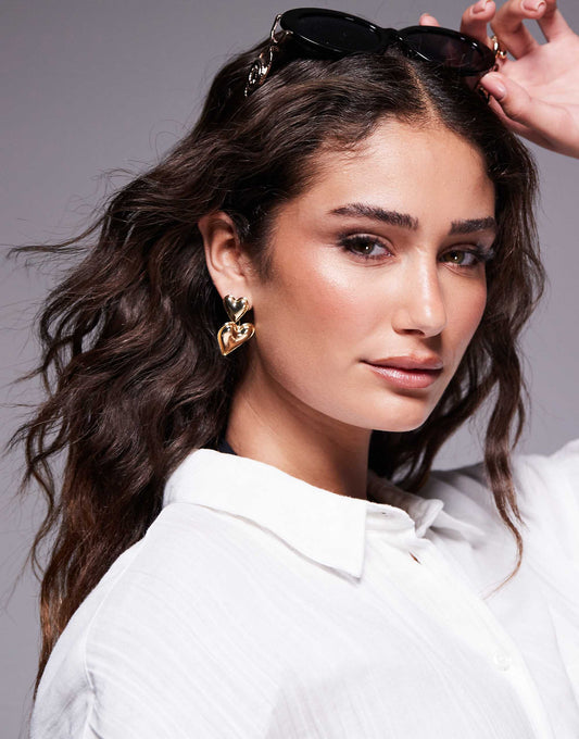 Kaiia exclusive double heart earrings in gold
