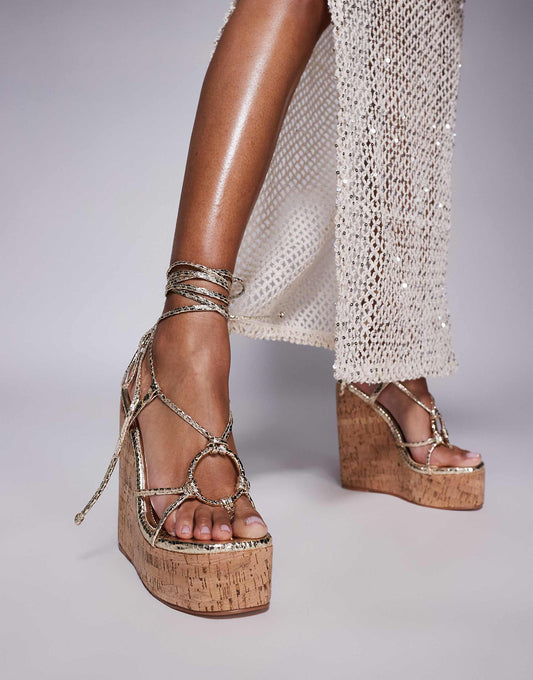 Simmi London Jadey Wide Fit strappy high heeled wedges in gold