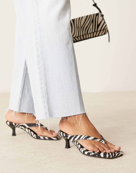 ASOS DESIGN Hawaii toe thong kitten heeled sandals in zebra print