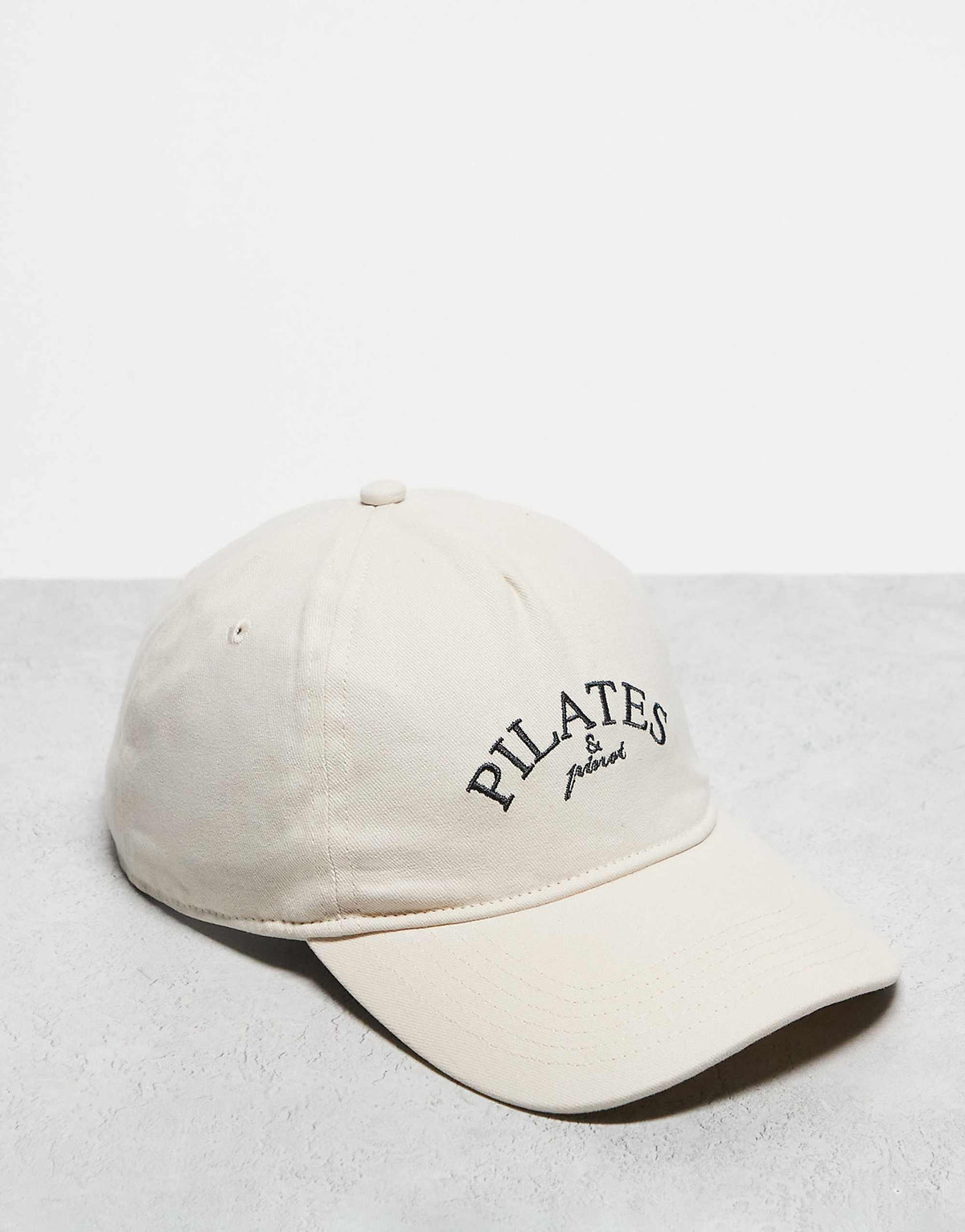 The Couture Club pilates and pinot cap in off white