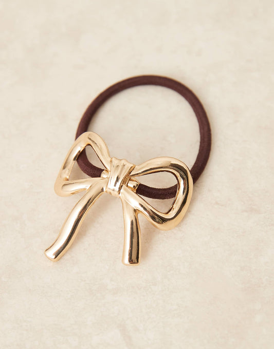 ASOS DESIGN hairband with metal bow detail in gold