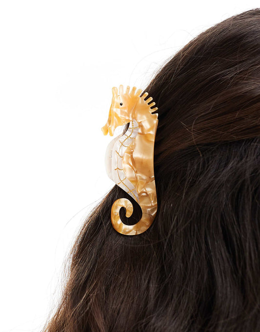 Pieces marbled effect seahorse hair claw in orange