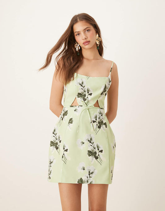 ASOS DESIGN structured cutout mini dress with bow in sage floral print