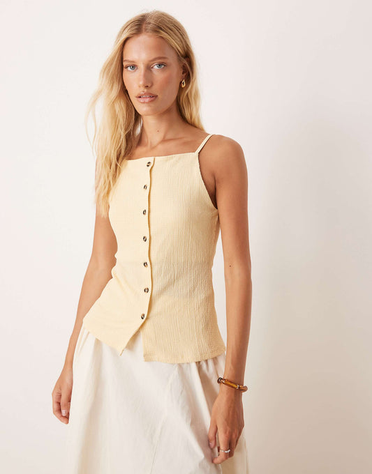 ASOS DESIGN textured button through strappy top in buttermilk yellow